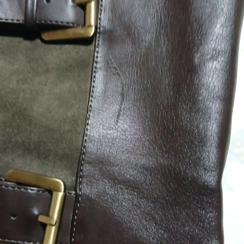 9&Co size 8 brown tall boots, with decoractive buckles. Man made materials.